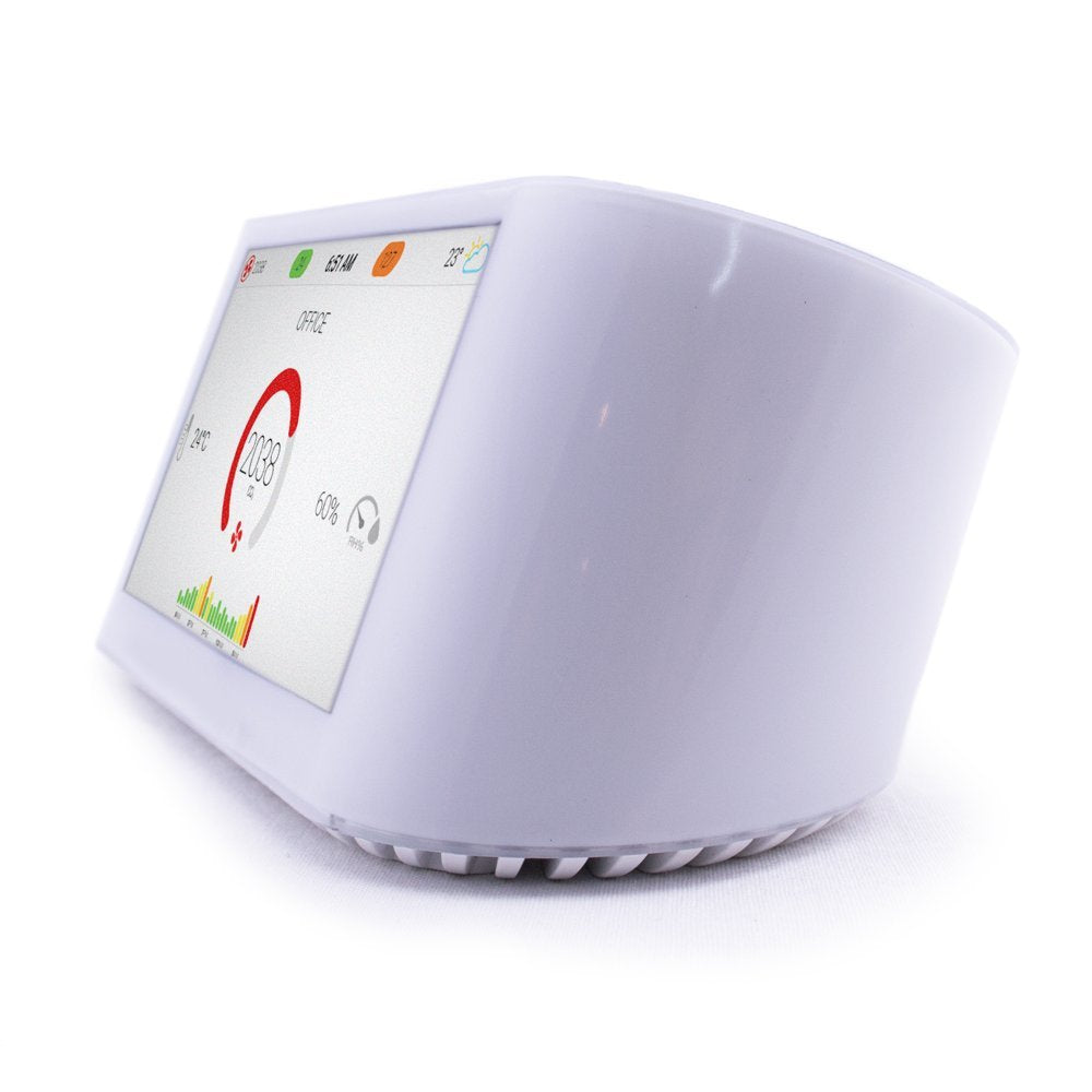 Smart air quality monitor with digital display showing temperature, humidity, and CO2 levels